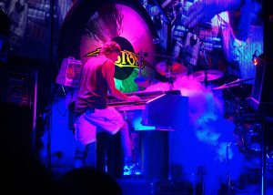 Smokin': Tom takes the organic approach onstage. Photo by Kamal Asar.