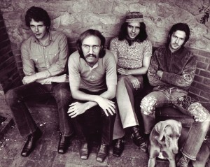 Sitting on Top of the World: Radle, Gordon, Whitlock, Clapton, and four-legged  friend take a break during the Layla sessions. Photo courtesy Polygram Press Archive.