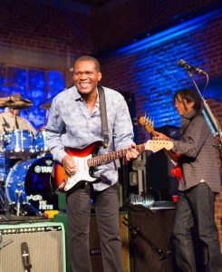 ROBERT CRAY SMILING WITH STRAT - PHOTO BY JAMES L. BASS